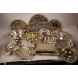 A large quantity of silver plated wares including tureens, coasters, bread baskets etc