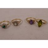 Four 9ct gold gem set dress rings, size 'O/P', gross 8.7 grams