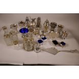 A quantity of good quality silver plated items including glass bottle, cruets, sugar sifter,