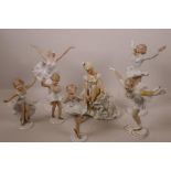 A collection of five Goebel porcelain figurines of dancers and two ice skaters, both A/F