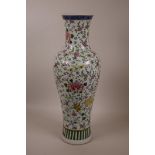 A Chinese famille verte porcelain vase with enamelled floral and butterfly decoration, 6 character