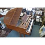 A Gors and Kallmann of Berlin rosewood baby grand piano, sound board stamped A.D. Lexow, No.