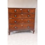 A C19th mahogany chest of two over three drawers with turned ebony handles and ivory escutcheons,