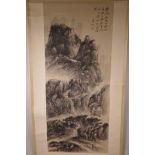 A Chinese watercolour scroll depicting figures on a winding mountain path, 14½" x 33½"
