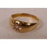 An 18ct gold diamond set gypsy ring, size 'Q/R', gross 2.3 grams