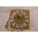 A C18th longcase clock movement with engraved brass dial with cast spandrels, silvered chapter