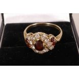 A 9ct gold ruby and old cut diamond dress ring, size 'Q/R'