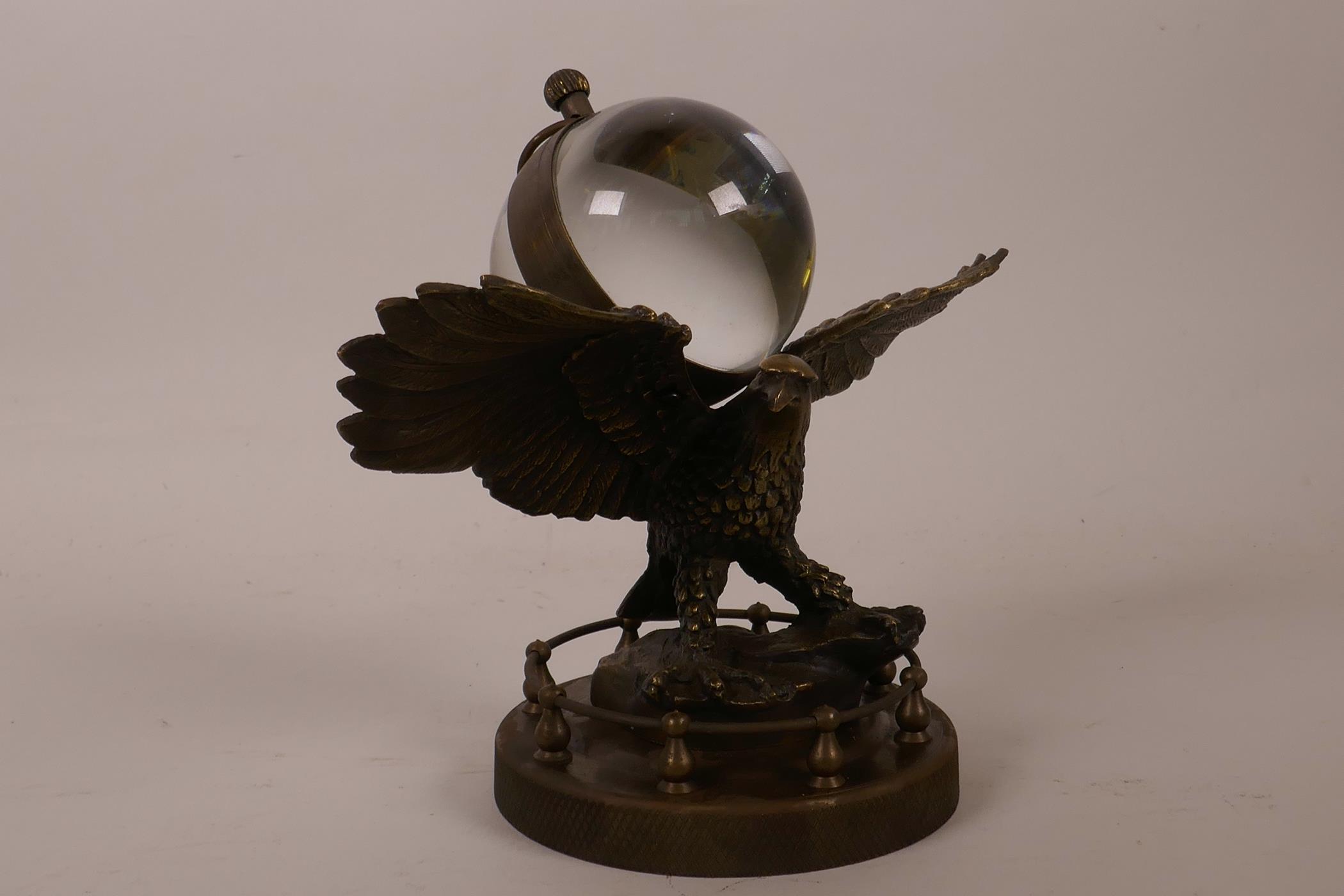 A novelty bronzed metal desk clock in the form of an American eagle with a ball clock on its - Image 2 of 3