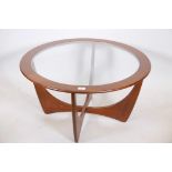 A teak G-Plan Astro coffee table with inset glass top, 33" diameter