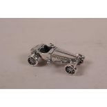 A novelty white metal miniature model of a classic sports car, 1½" long