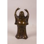 A Chinese bronze figure of Hotei, 5½" high