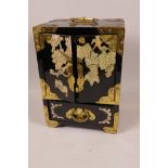 A Chinese brass bound lacquered jewellery box with inlaid decoration, the two doors revealing