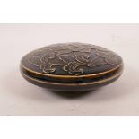 A Chinese cizhou kiln shallow box and cover with raised lotus flower decoration, mark to base, 5"