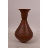 A C19th Turkish Tophane pottery vase with carved decoration 7" high