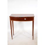 A late C19th inlaid mahogany bow front single drawer side table, on tapering supports, 30" x 16",