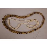 A vintage horn bead necklace, 26" long, and a bone necklace with gilt clasp