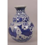 A Chinese blue and white porcelain bulbous vase decorated with carp and water plants, 6 character