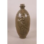 A Chinese grey crackle glazed pottery vase with raised phoenix decoration, 13" high