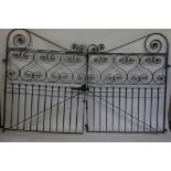 A pair of large wrought metal gates, 48" x 62"