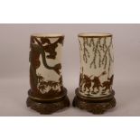 A pair of Royal Worcester vases in the form of Japanese Shibayama tusks decorated with a parade of