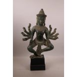An Indian bronze of Shiva with green verdigris patina, 18½" high