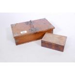 A Victorian oak and brass bound cigar box with two divisions, one hinge A/F, and a figured wood