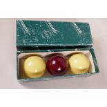 A set of three Aramith full size billiard balls