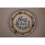 A Russian style porcelain cabinet plate bearing the propaganda slogan 'Sieg der Werktatigen' (