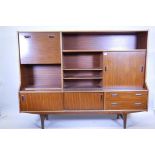 A 1970s retro teak display/drinks cabinet, 72" x 16½"