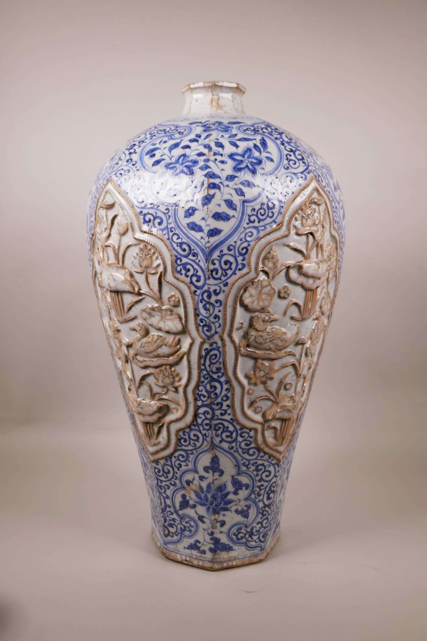 A large Chinese blue and white pottery vase of octagonal form, the panels with raised decoration - Image 5 of 6