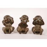 Three novelty Chinese bronzes of the hear no, speak no, see no evil monkeys, 2" high