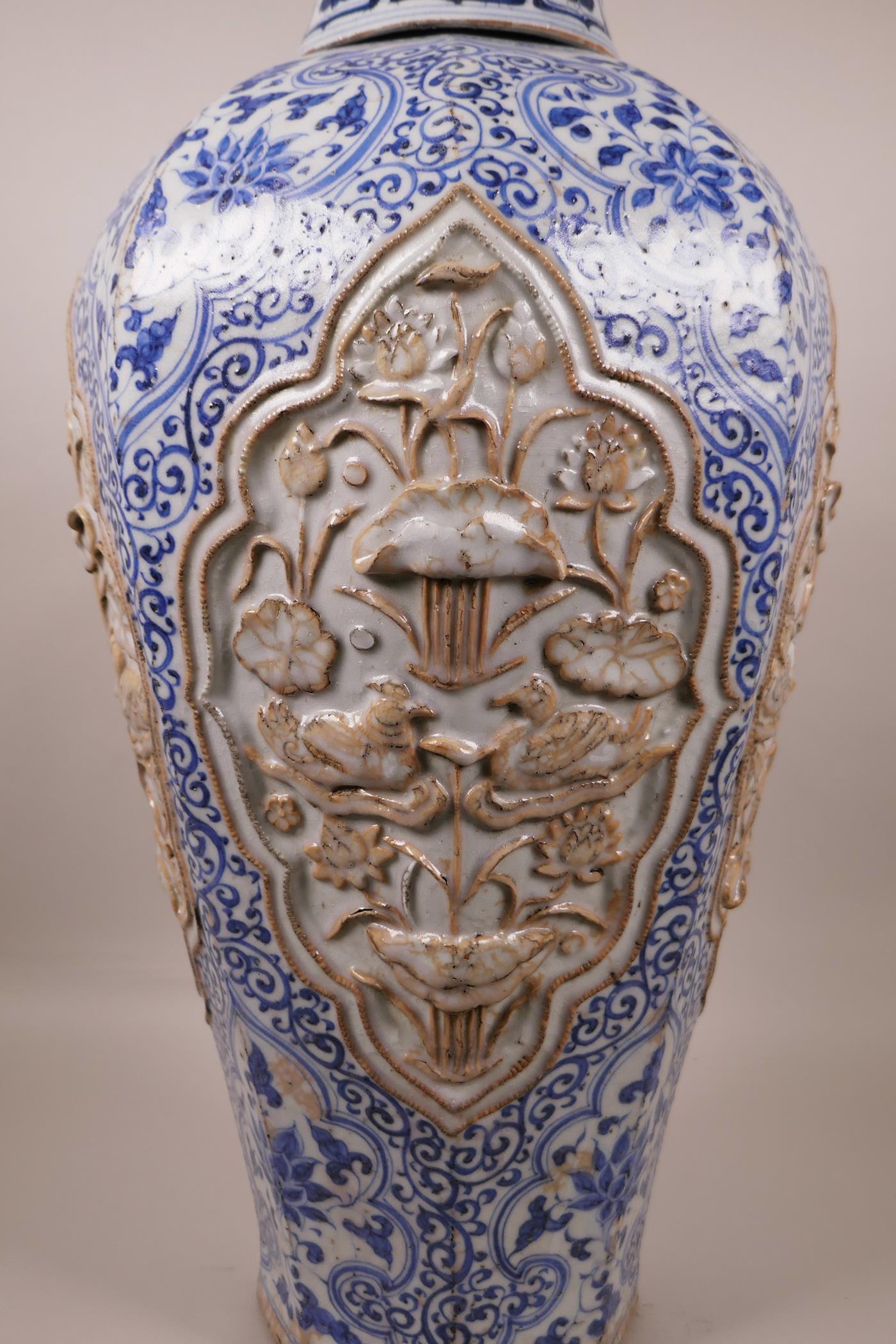 A large Chinese blue and white pottery vase of octagonal form, the panels with raised decoration - Image 3 of 6