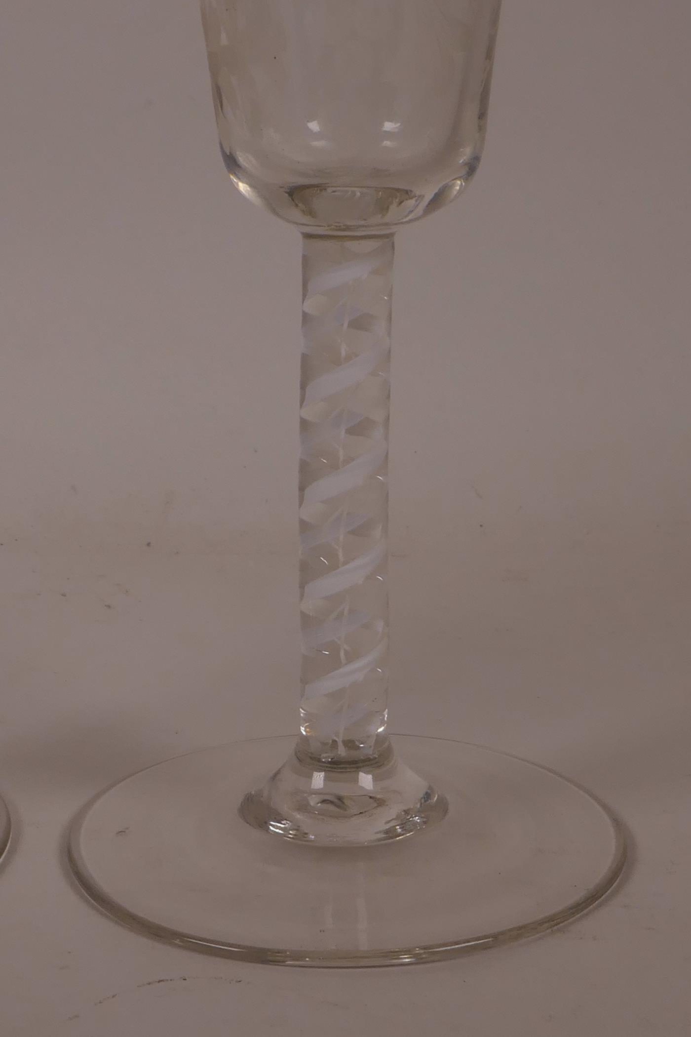 A pair of Georgian wine glasses with air twist stems and etched vine and bird decoration, 6½" high - Image 2 of 7