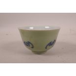A Chinese blue and white porcelain tea bowl with bat decoration, seal mark to base, 3½" diameter