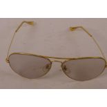 A pair of vintage Ray Ban aviator sunglasses, the frame marked B&L 62014 USA and B&L Ray Ban USA