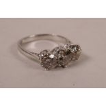 A 14ct white gold three stone diamond ring, approximately 1.91 carat, approximate size 'N'