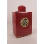 A Chinese red crackle glaze tea canister decorated with an auspicious character, 5" x 3½" x 8"