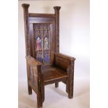 A Gothic style pine throne, with decorative painted plaster mouldings, 26" x 32" x 73"