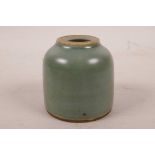 A Chinese celadon glazed porcelain water pot, twin ring mark to base, 2½" high