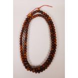 A string of horn beads, 60"