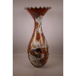 A large Japanese Meiji Satsuma vase with a flared and frilled rim, with decorative panels