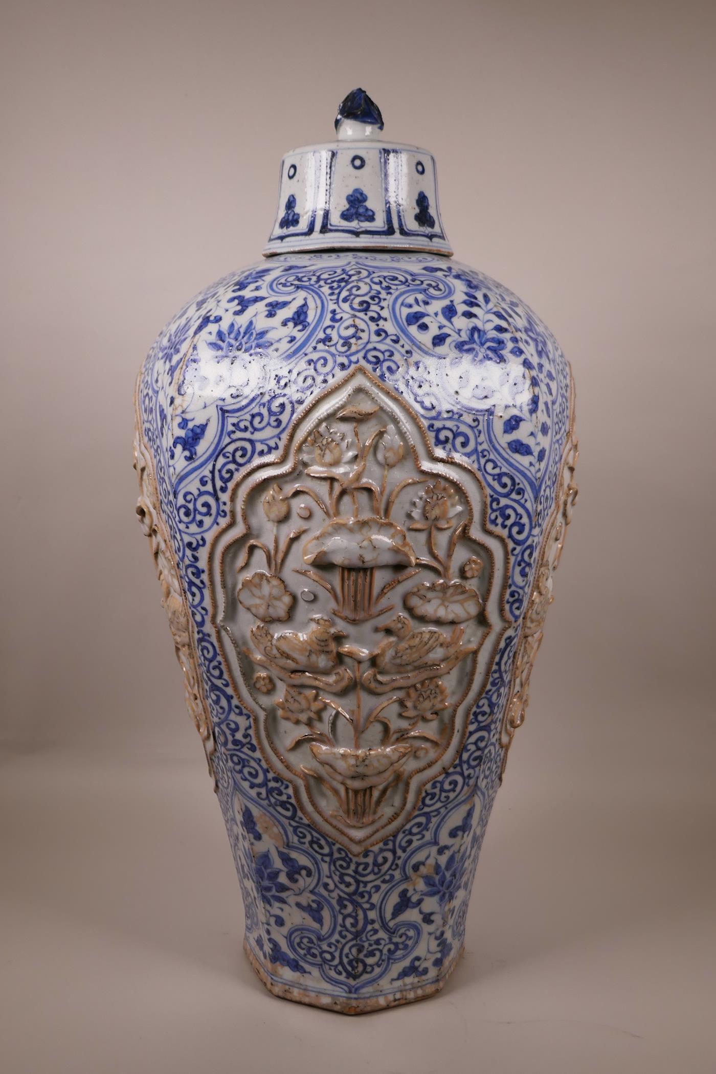 A large Chinese blue and white pottery vase of octagonal form, the panels with raised decoration - Image 2 of 6