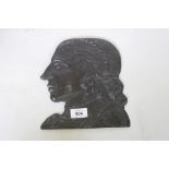 A C18th/19th carved oak dummy board head, 9" high