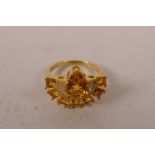 A silver gilt lady's Art Deco style ring set with cubic zirconium and citrine, approximate size 'N/