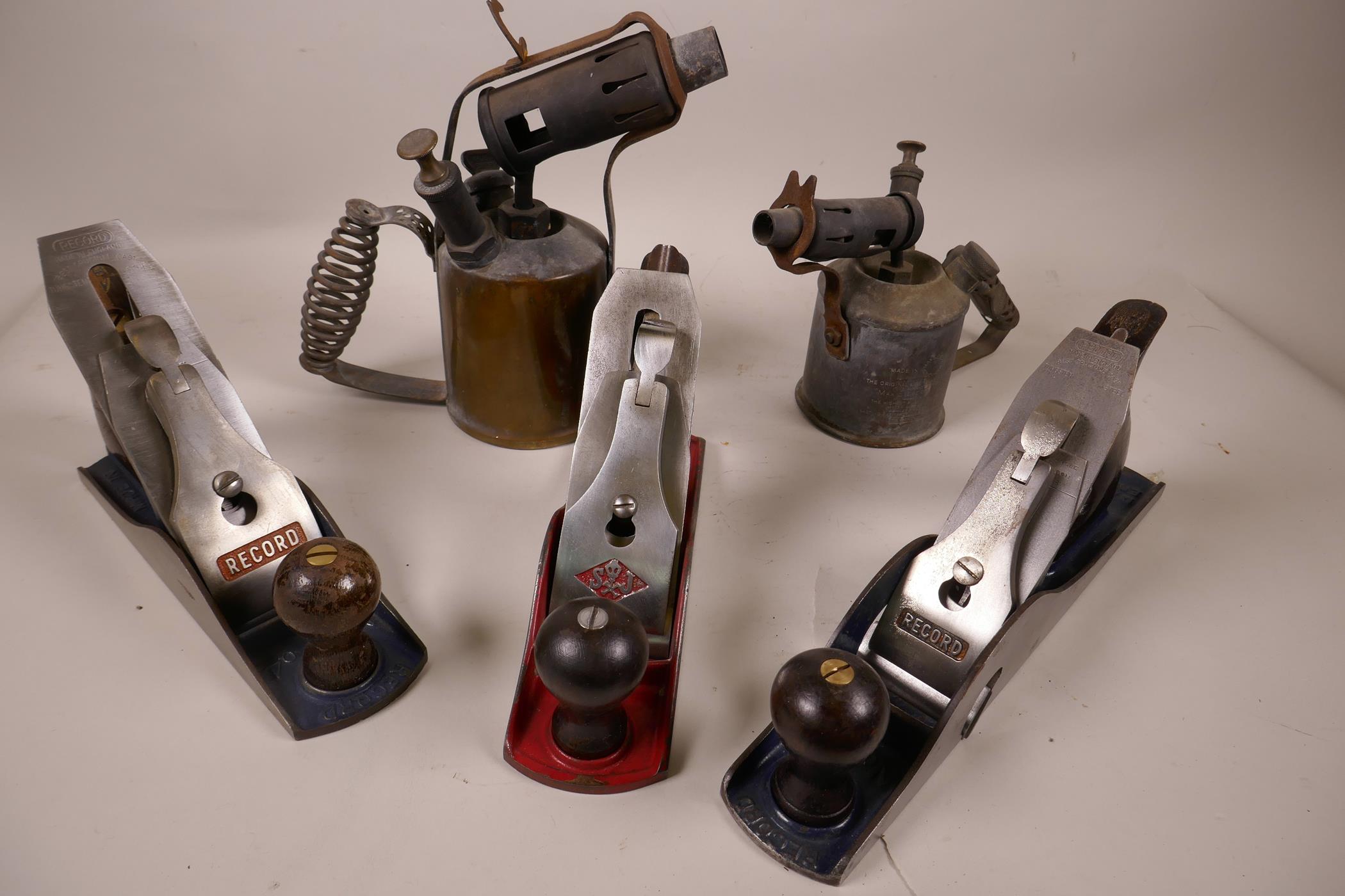 A Spear and Jackson smoothing plane, 10" long, together with two Record planes, no.010 and no.04,