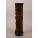 A Chinese bamboo and hardwood cylinder incense burner with carved and pierced dragon decoration, 10"