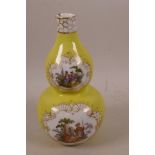 A C19th Continental porcelain double gourd vase decorated with panels of romantic figures on a