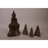 An early Thai bronze of Buddha, together with three smaller bronze Buddhas, largest 7" high
