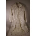 A Karen Millen two piece of sleeveless dress and long jacket in cream silk, size 8