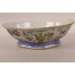 A Chinese Republic porcelain oval shaped footed bowl decorated with vases and symbols in bright